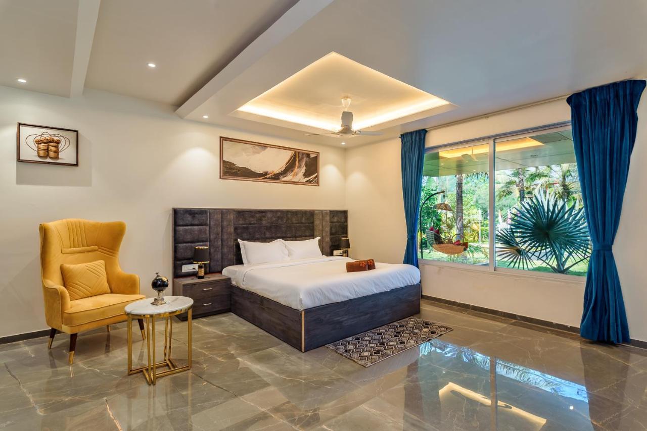 Saffronstays Palm Paradise, Kalyan Khadavli - Swimming Pool With Water Slides, Gazebo And Indoor Games Padghe エクステリア 写真